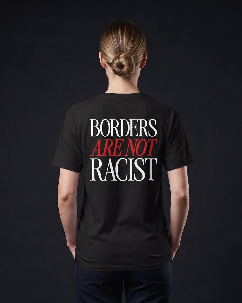 Frau trägt das WORN OPINIONS T-Shirt Borders are not racist in Schwarz von hinten, Rückenprint Borders are not racist