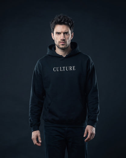 Mann trägt den WORN OPINIONS Hoodie Culture is worth keeping in Schwarz von vorn, Brustprint Culture