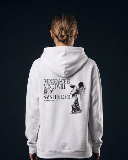 Frau trägt den WORN OPINIONS Hoodie Vengeance is mine in Weiß von hinten, Rückenprint "Vengeance is mine, I will repay," says the Lord, Romans 12:19