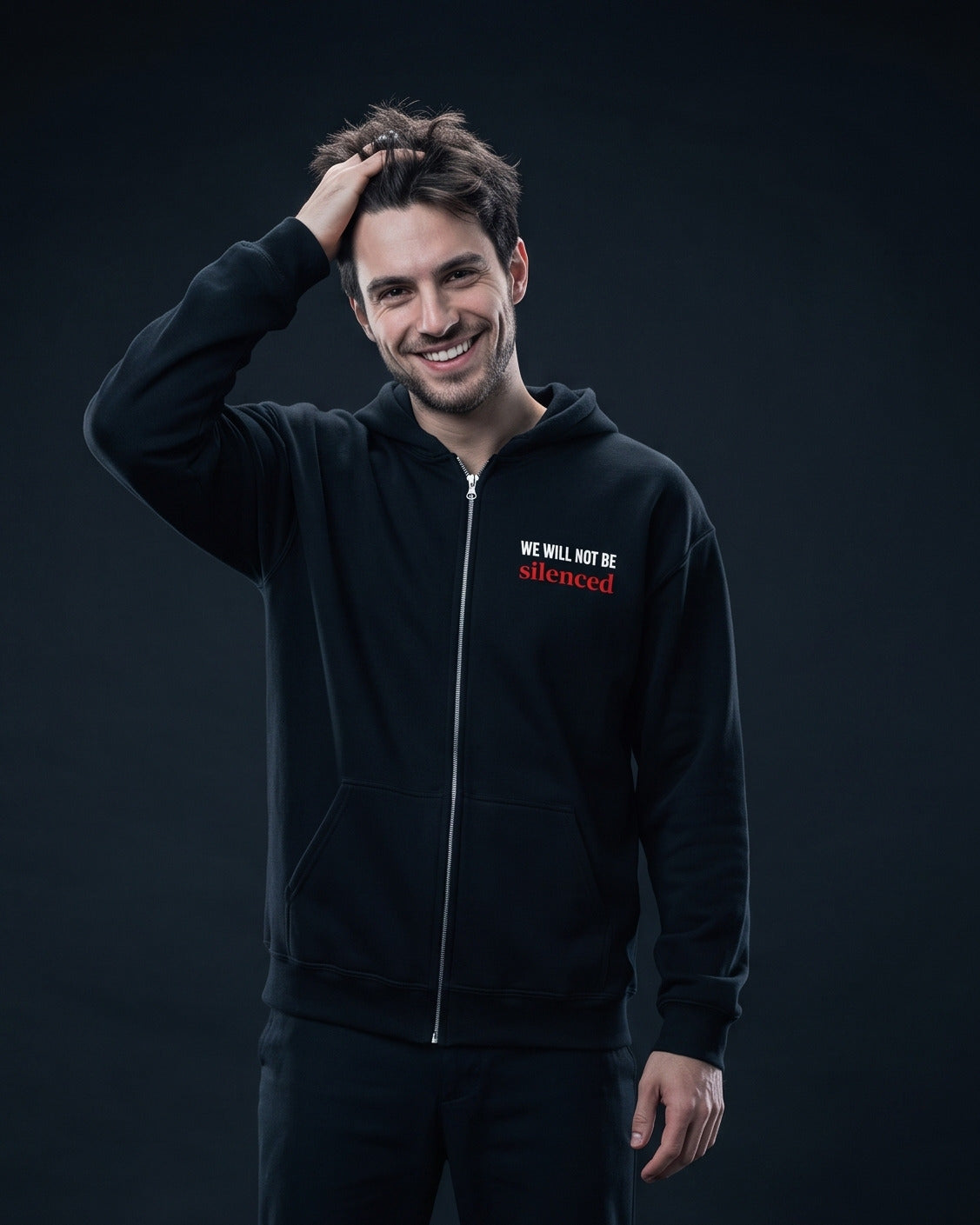 Mann trägt den WORN OPINIONS Zip-Hoodie We will not be silenced in Schwarz, Brustprint: WE WILL NOT BE silenced